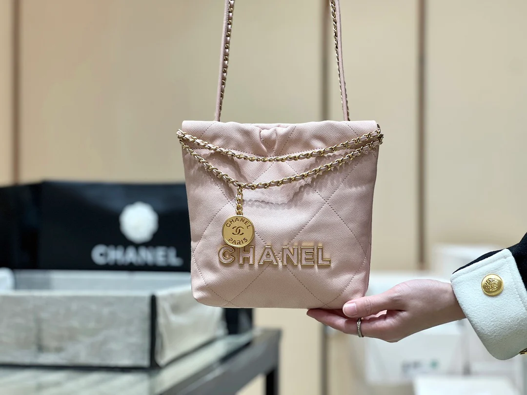 Мини-сумка Chanel Mini 22, лимитированная серия, мусорный мешок - розовый.