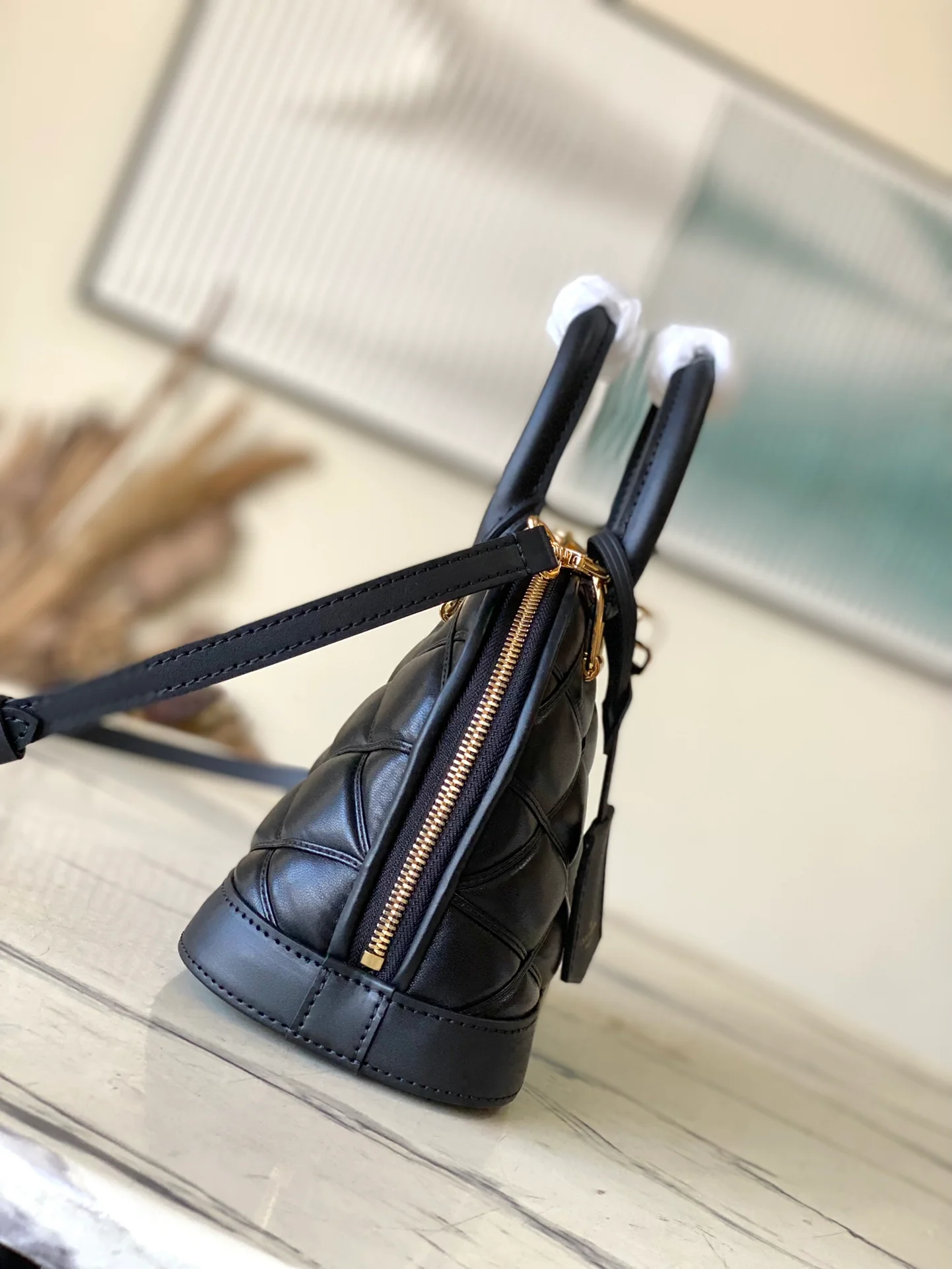 m23666-LV-nicolas-ghesquiere-shell bag-black