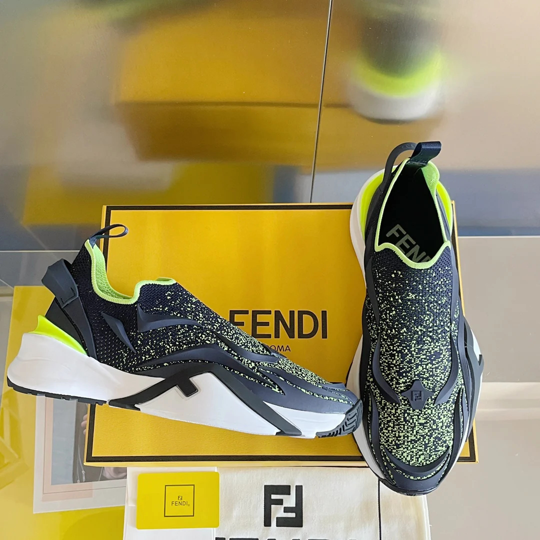 Новинка 2023 года от Fendi - кроссовки Flow Series Flyknit - черно-желтые.