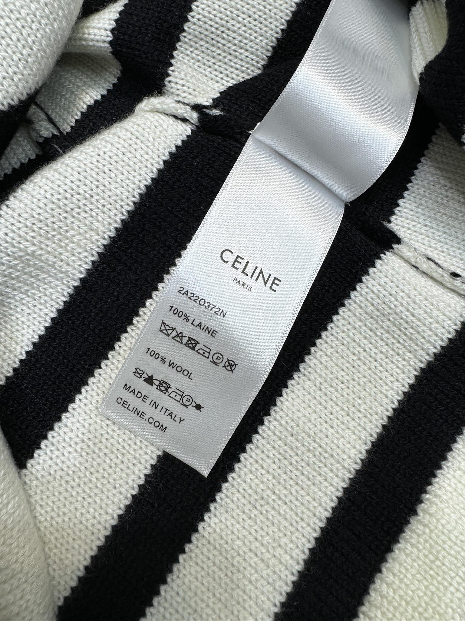 Вязаная юбка миди Celine 2404 с кружевной отделкой и полосатым рисунком в стиле колор-блок.