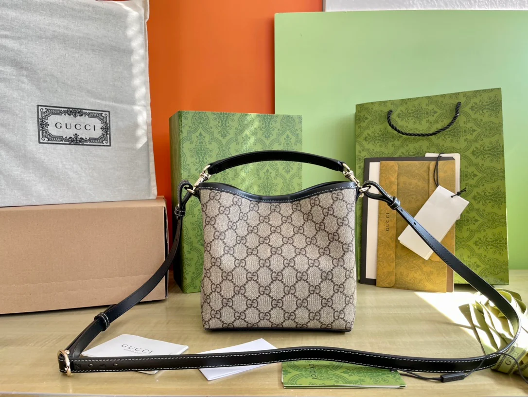 Мини-сумка Gucci 2025 из черной кожи - коричневая