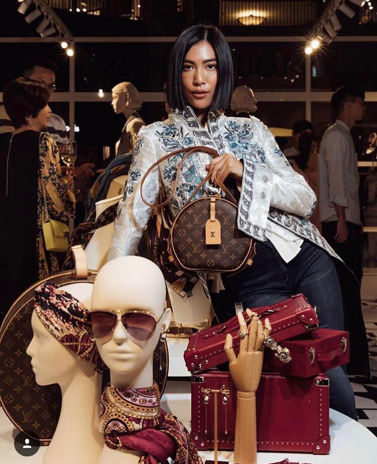 Круглая сумка LV