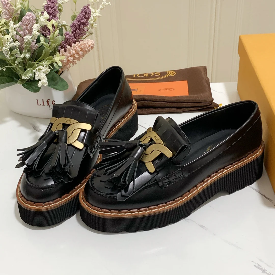 Лоферы на платформе Tods с кисточками