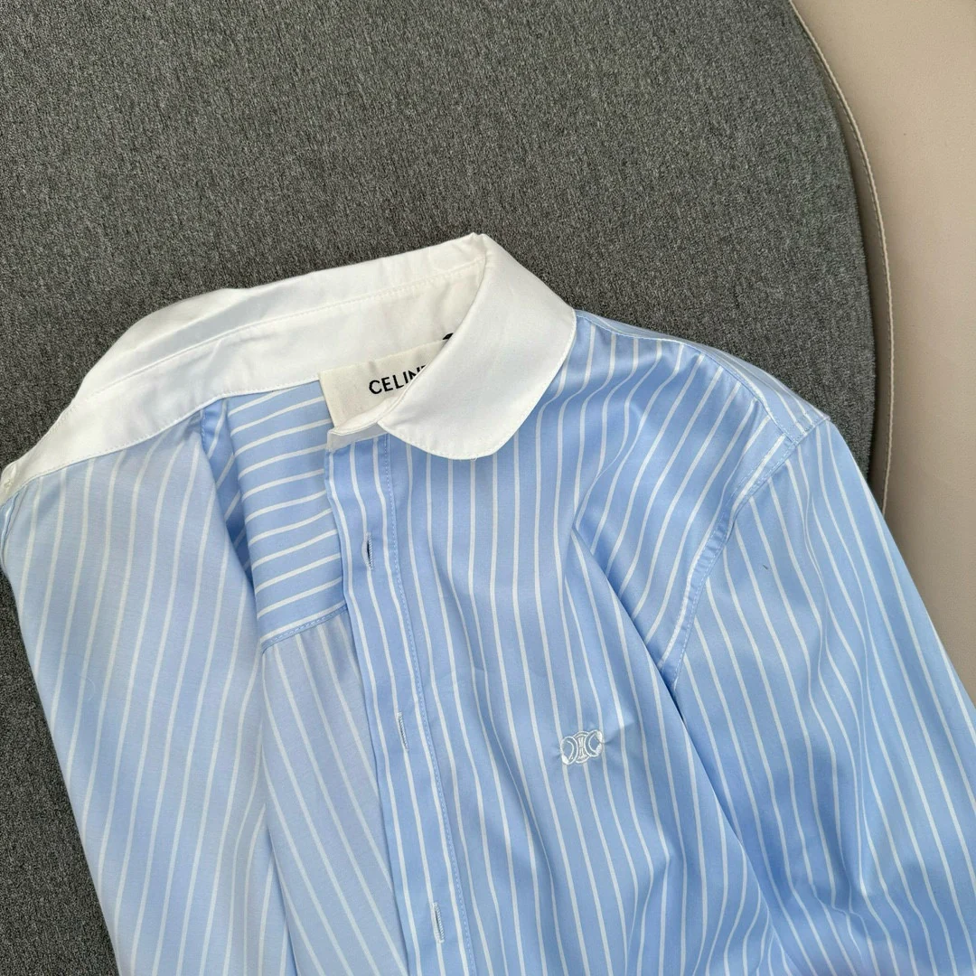 Новинка сезона весна/лето 2024 от Celine: рубашка в сине-белую полоску с вышивкой ?Триумфальная арка?.