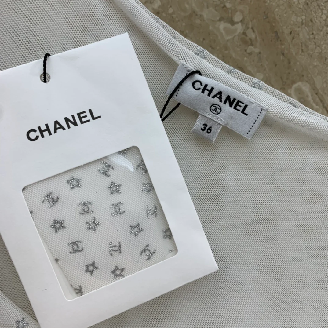 Chanel 2403 - Свободный жилет без рукавов из серебристой пряжи 