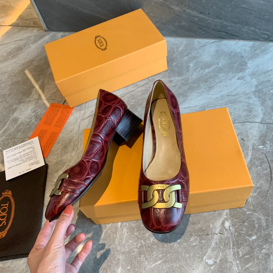 Туфли на низком каблуке Tods