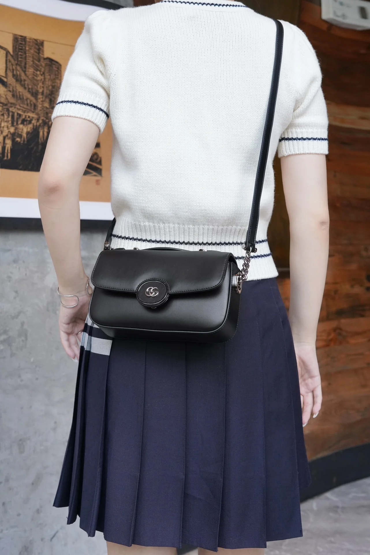 Миниатюрная сумка Gucci Petite GG на цепочке - черная.