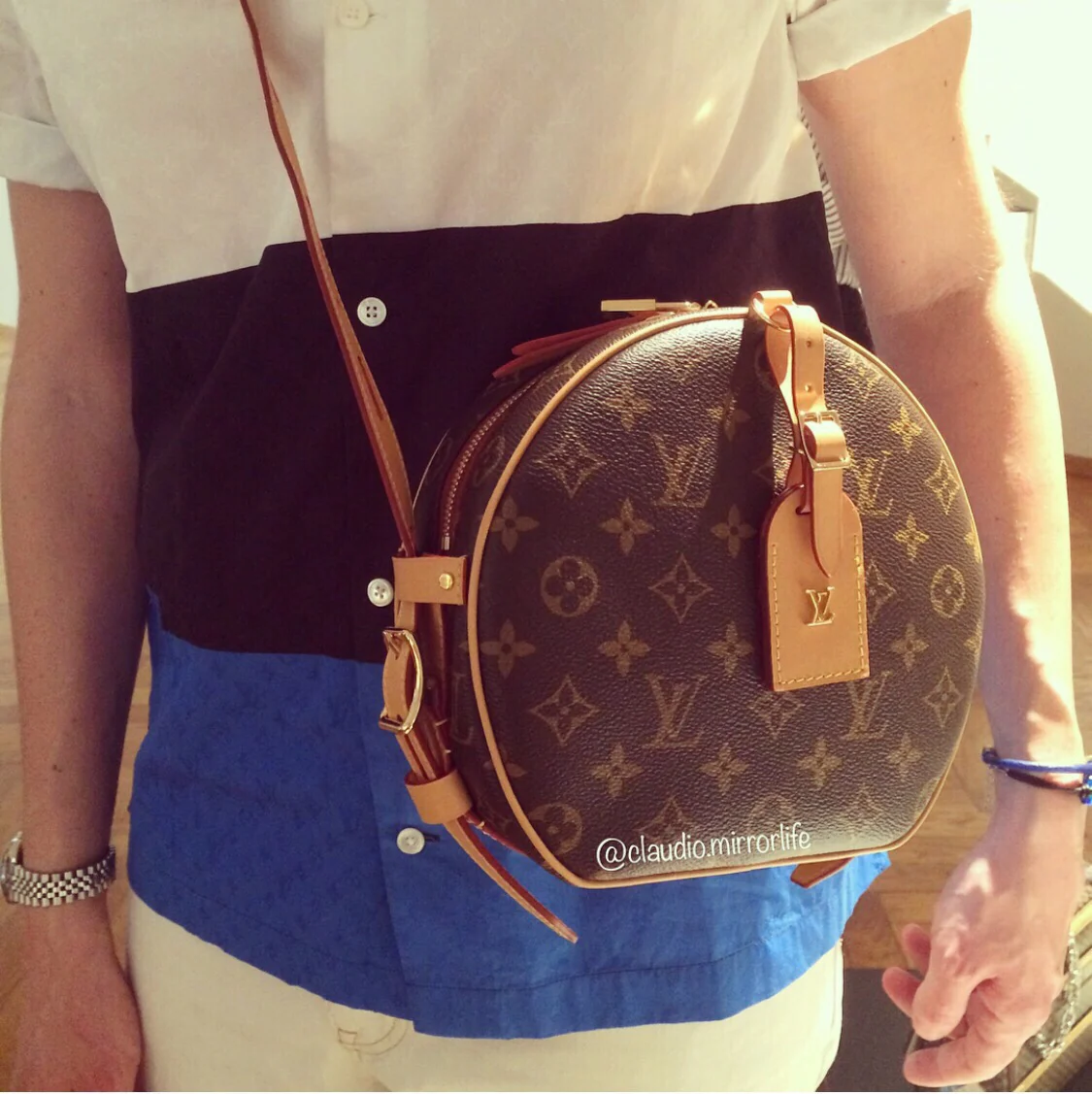 Круглая сумка LV