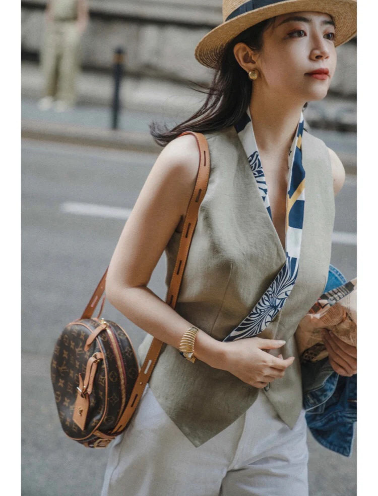 Круглая сумка LV