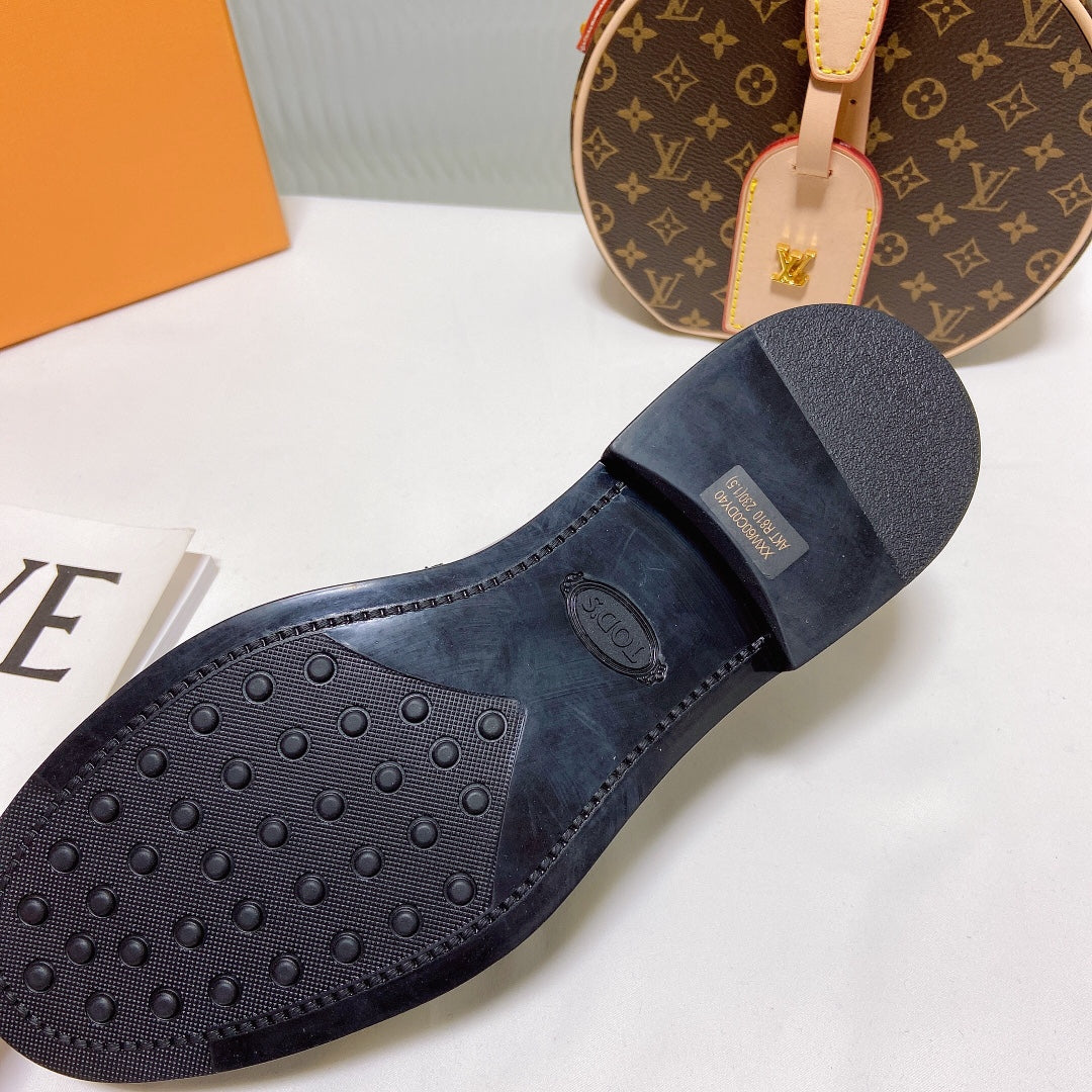 Лоферы на платформе Tods