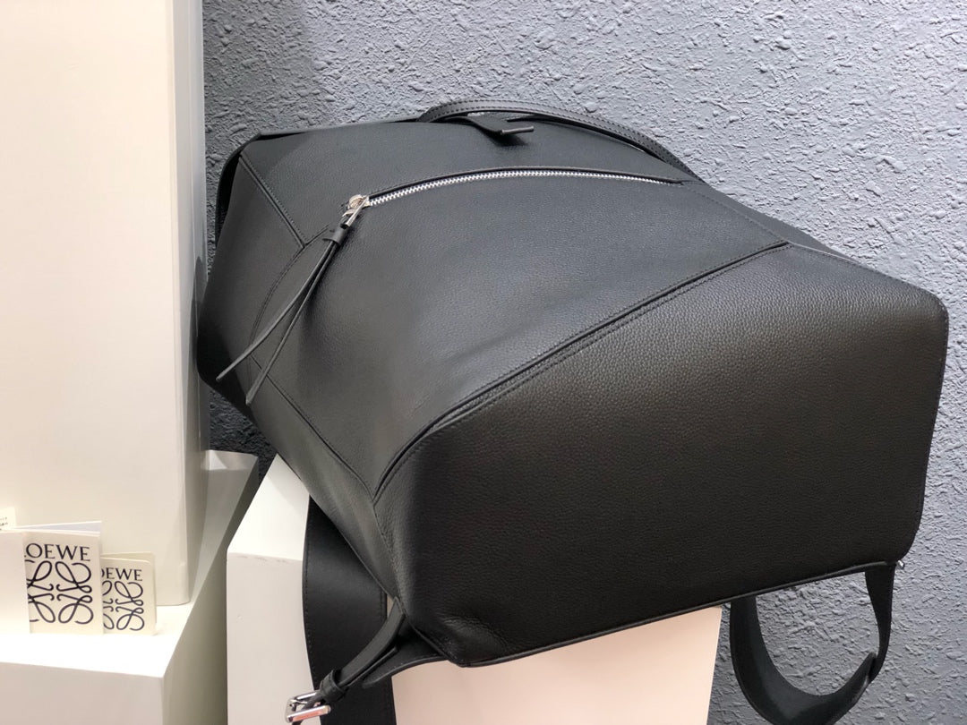 Мужской рюкзак Loewe Puzzle из телячьей кожи.