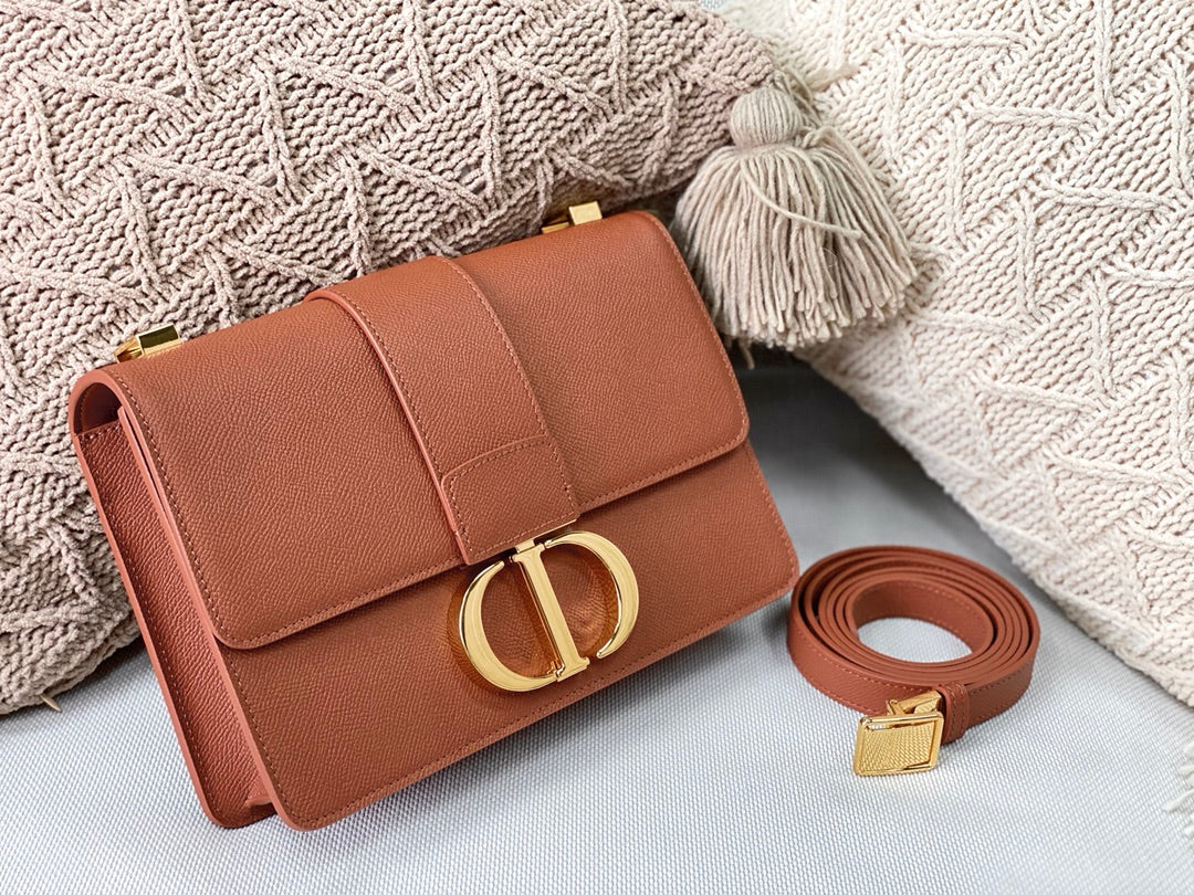 Часы Dior Montaigne серии 30, 24 см, телячья кожа с принтом в виде пальмовых листьев, застежка из темной бронзы.