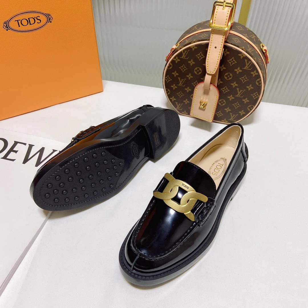 Лоферы на платформе Tods