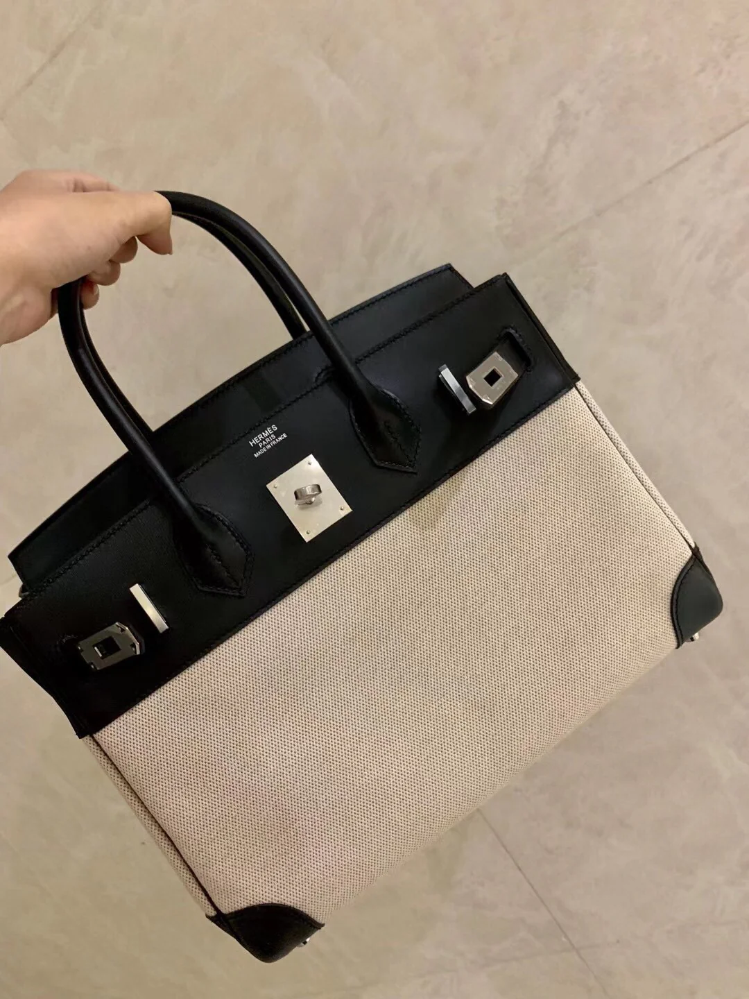 Сумка Hermes Birkin 35 — из телячьей кожи и парусины — черная.