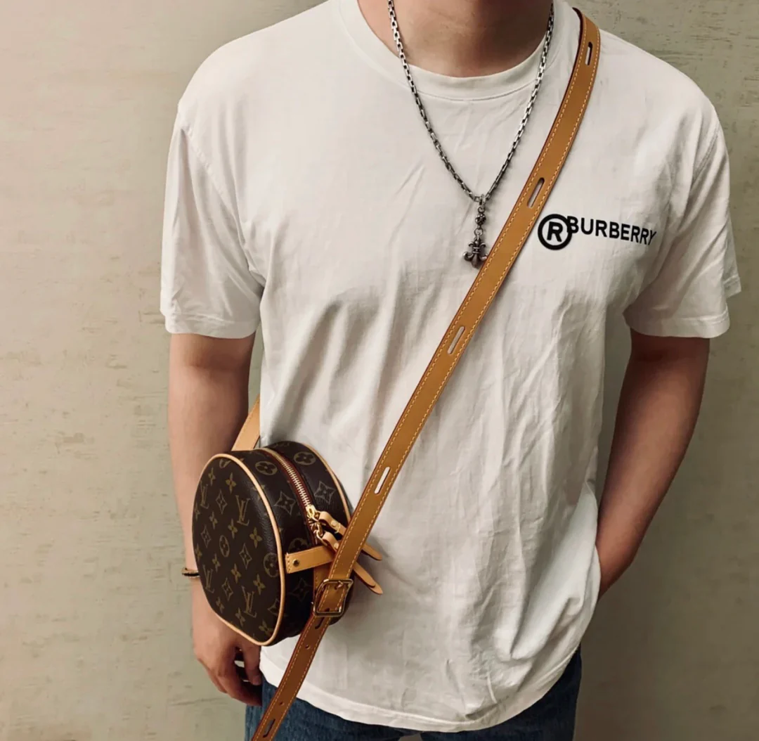 Круглая сумка LV