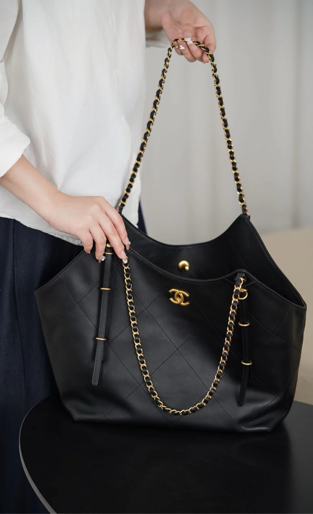 Маленькая сумка Chanel 25stote - черная