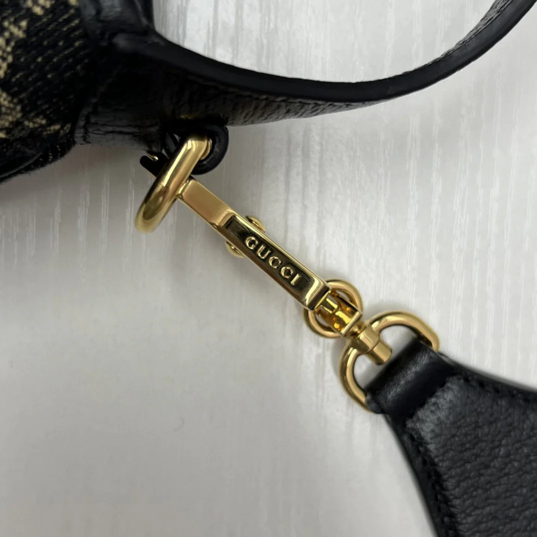 Джинсы Gucci Jackie 1961 из черного денима.