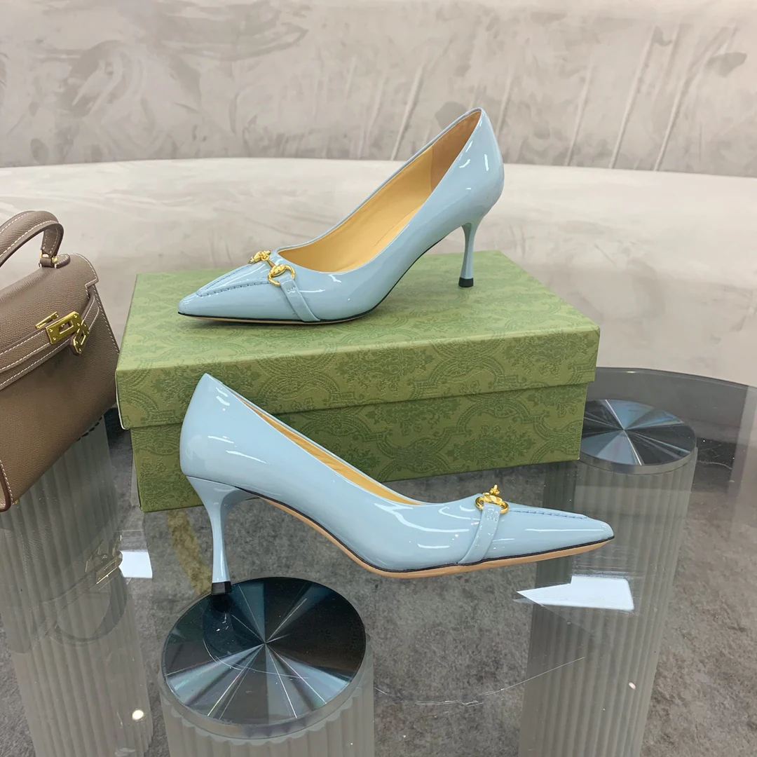 Туфли на высоком каблуке Gucci с острым носком и пряжкой в ??форме подковы