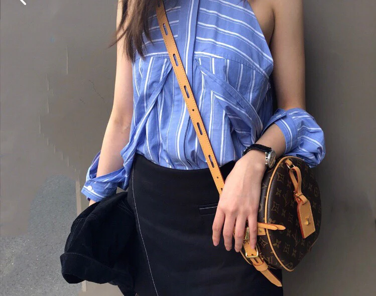 Круглая сумка LV