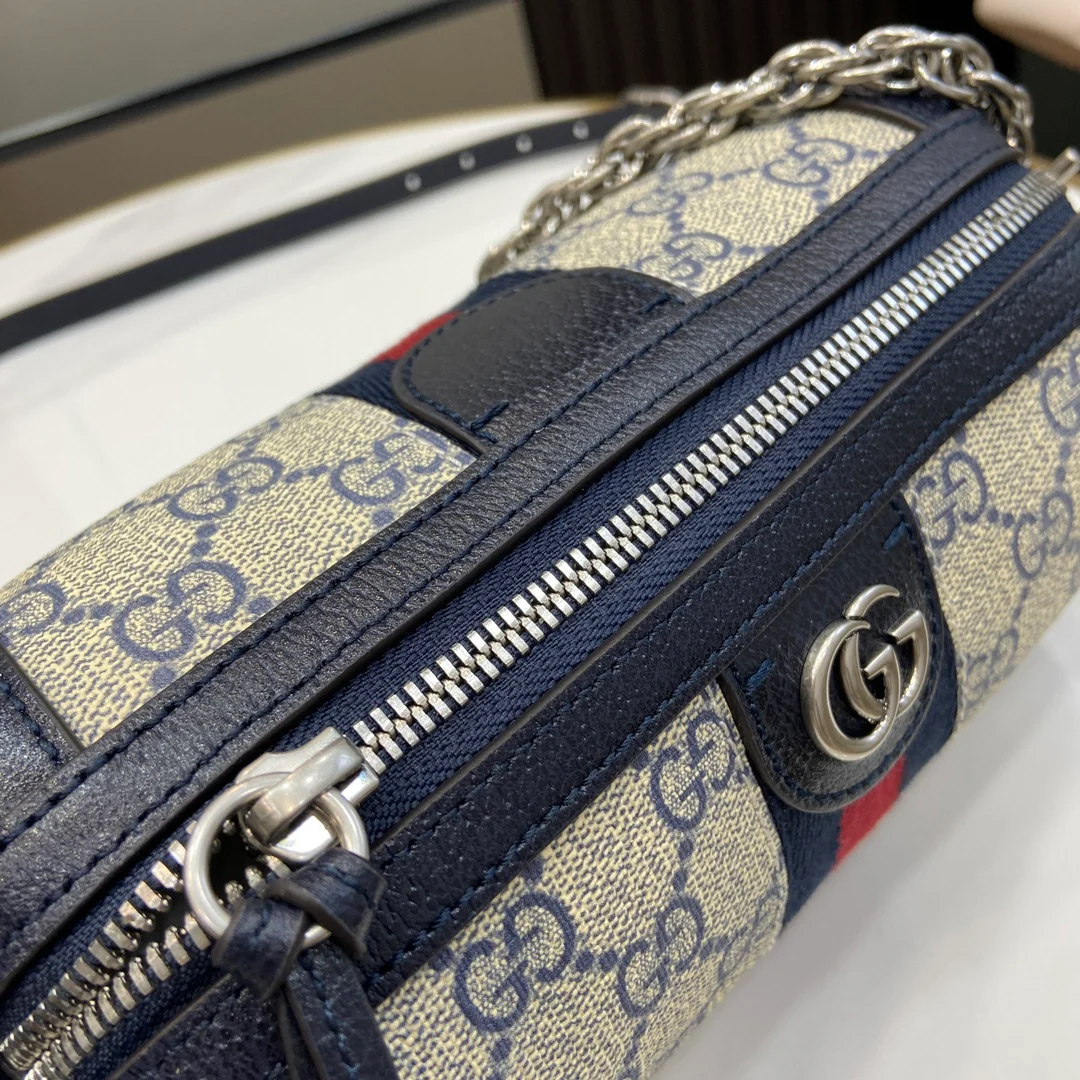 Миниатюрная цилиндрическая сумка Gucci Ophidia - с черной отделкой.