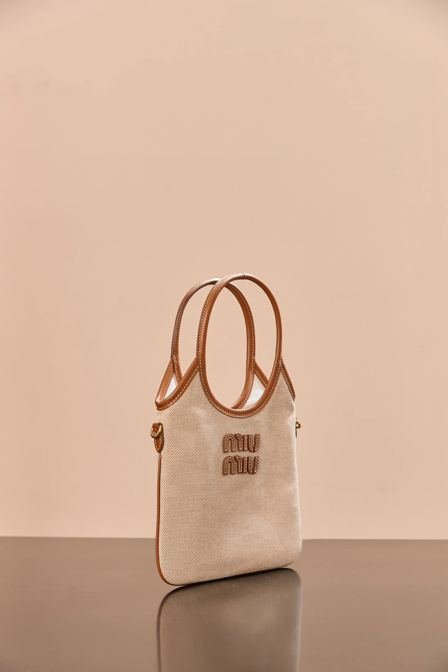 Сумка-шоппер Miu Miu-5ba281m650-??? Маленькая, из белого холста.