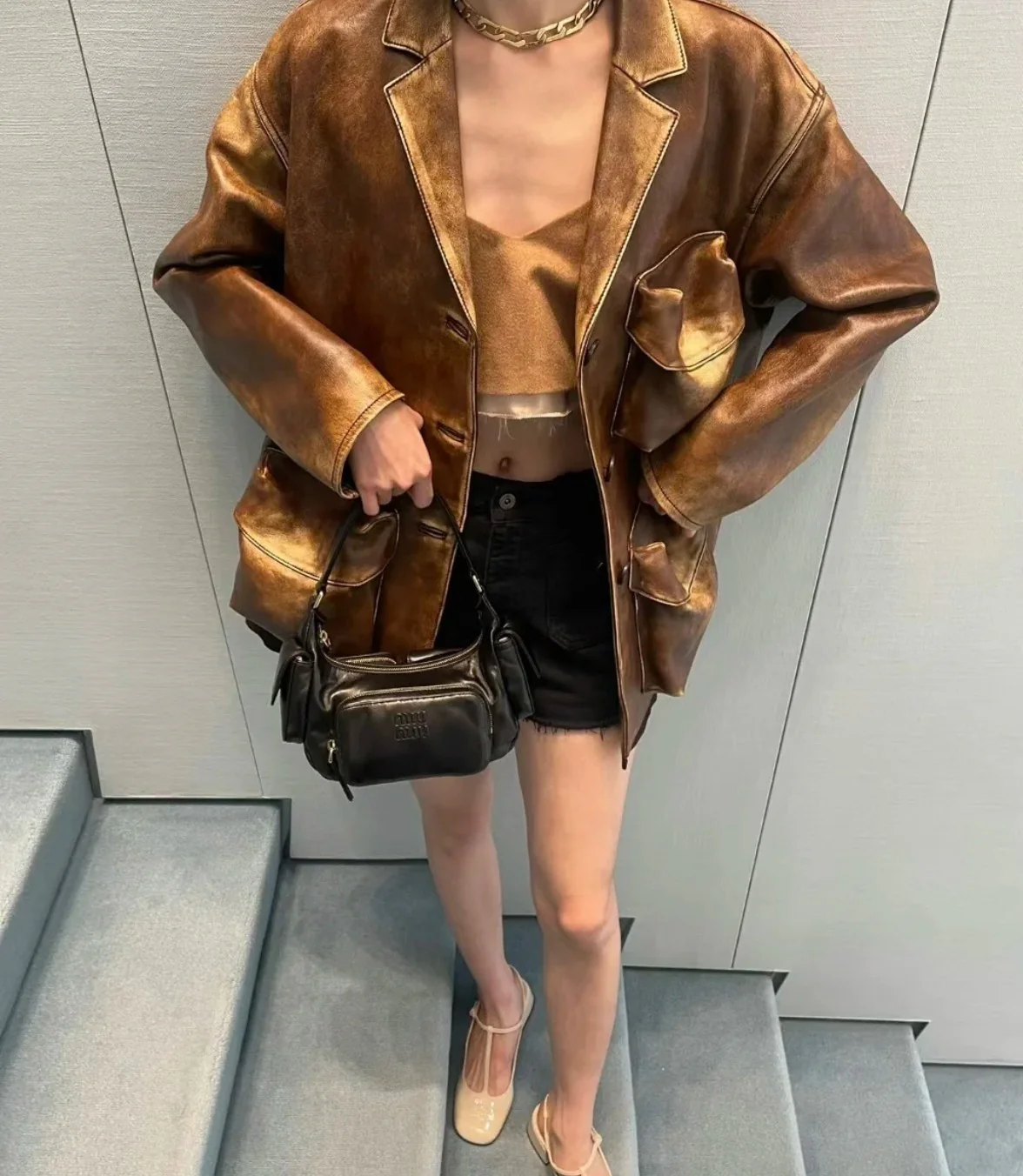 Сумка-клатч Miu Miu из кожи наппа — черная