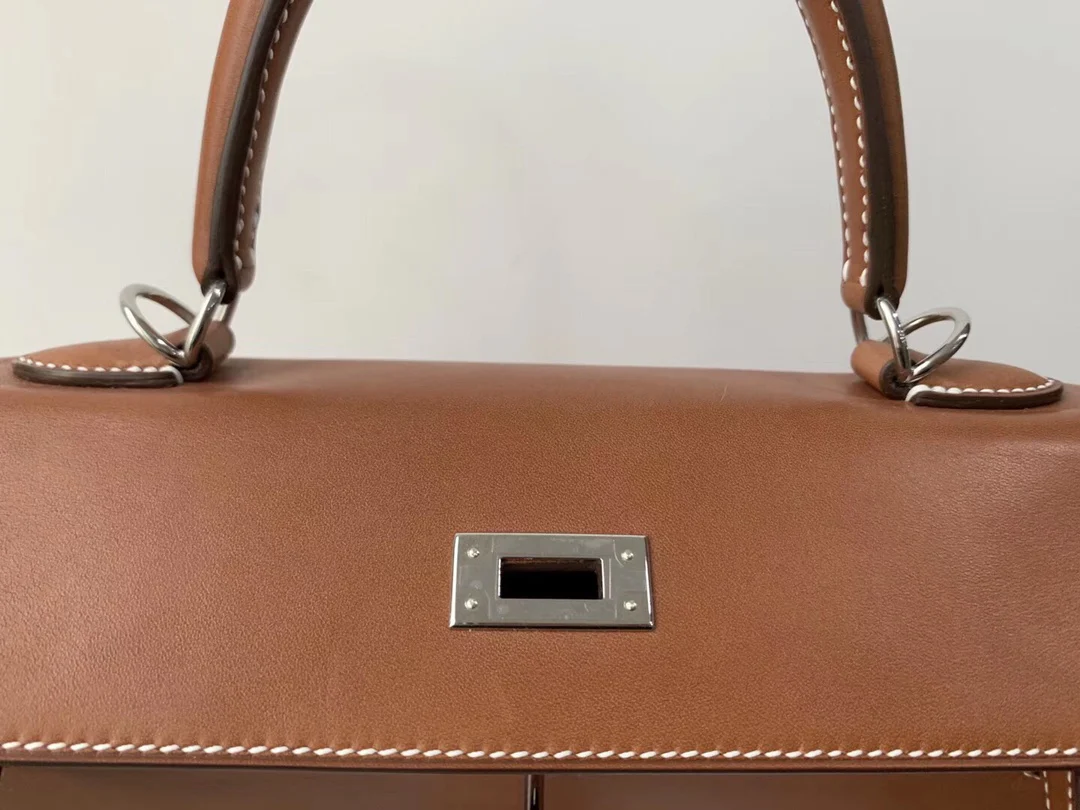 Пряжка Hermes Kelly 25 Barenia Haas из натурального серебра