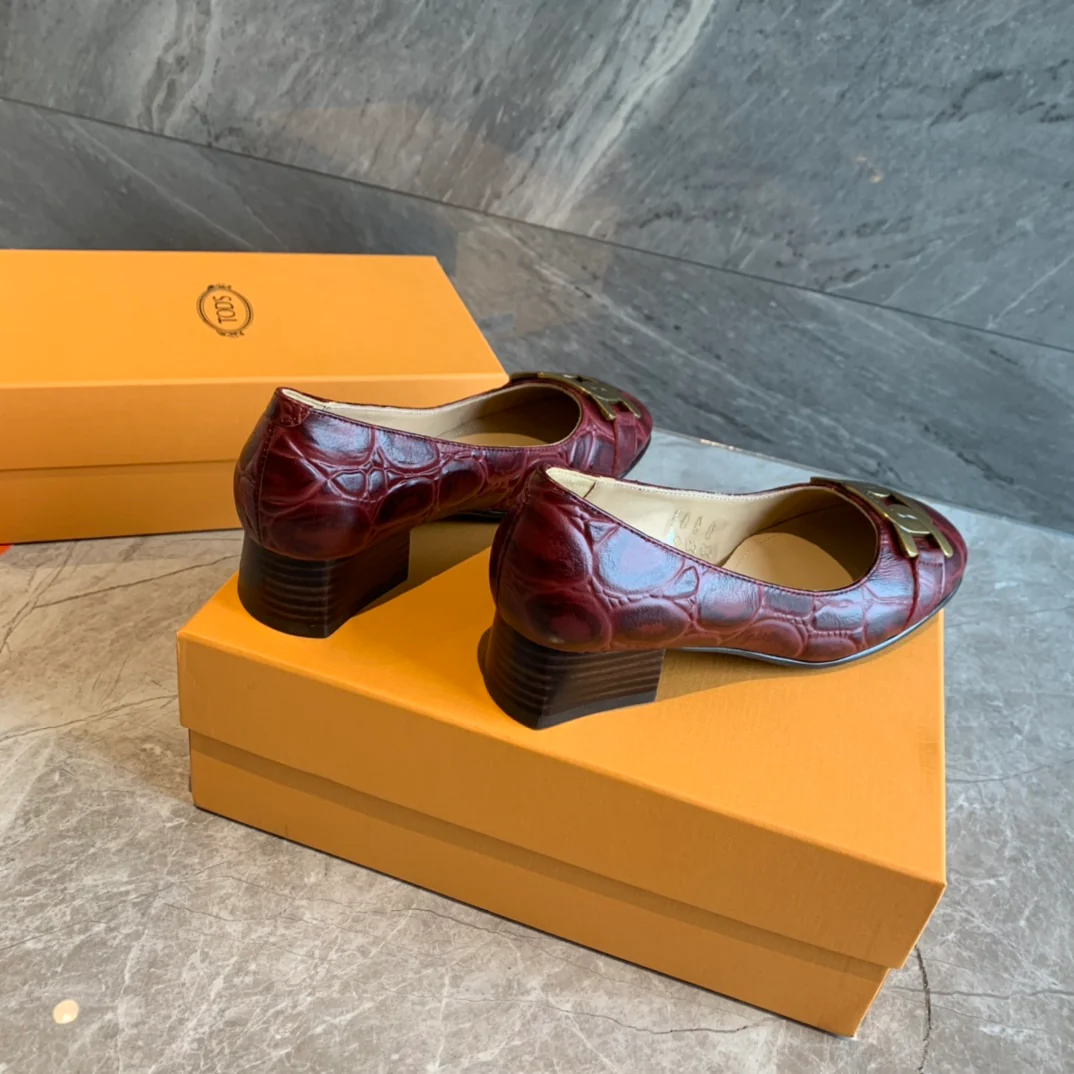 Туфли на низком каблуке Tods