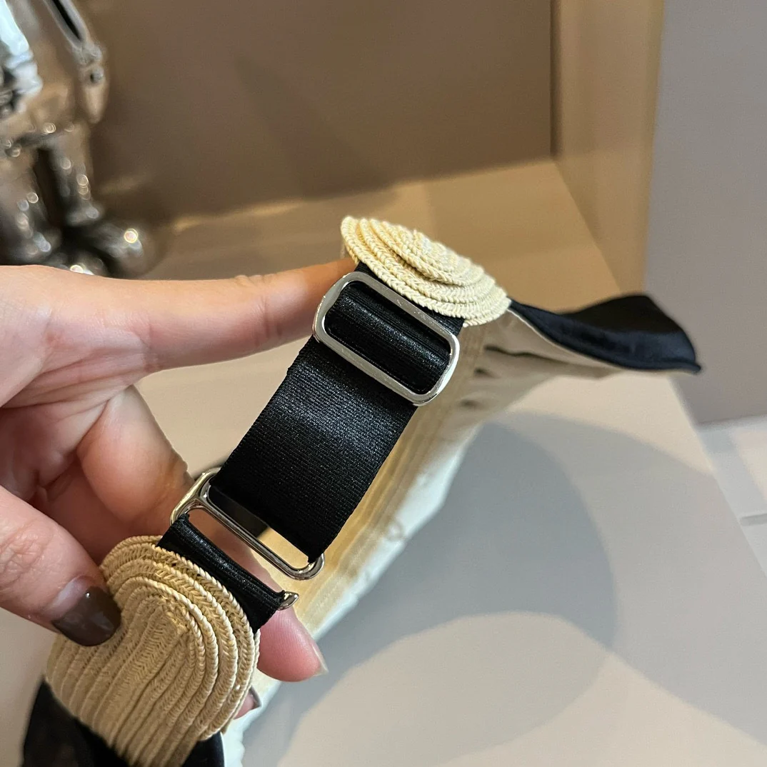 Солнцезащитная шляпа Chanel из атласа с перламутровым блеском - черная