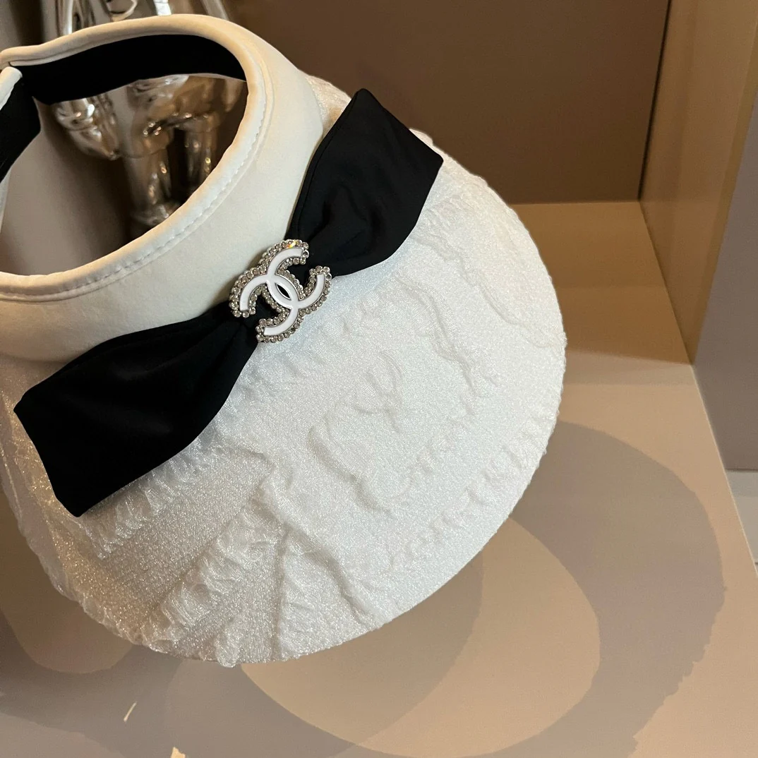 Chanel - Белая шляпа от солнца с бантом