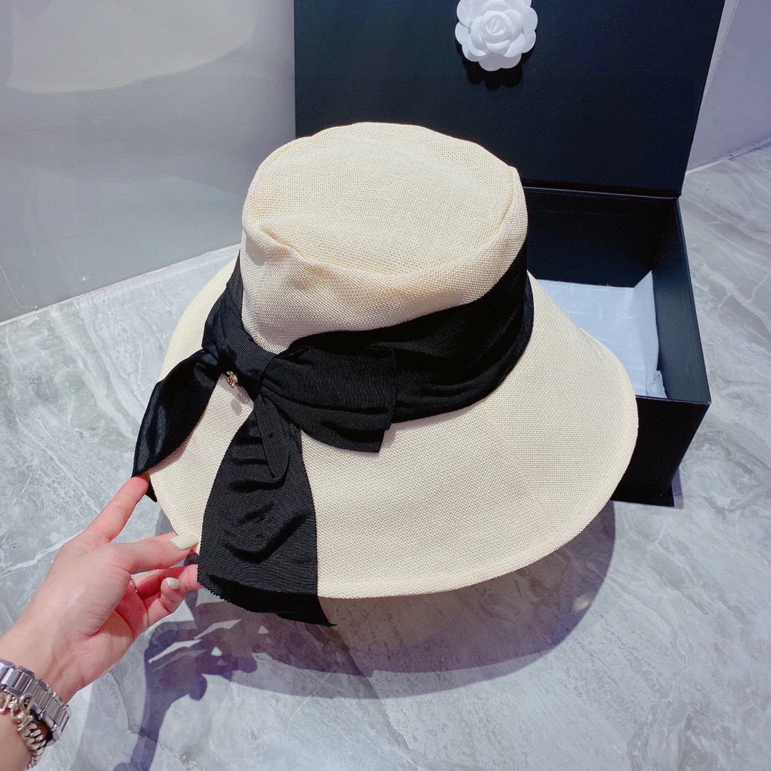 Шляпа Chanel с большим бантом от солнца