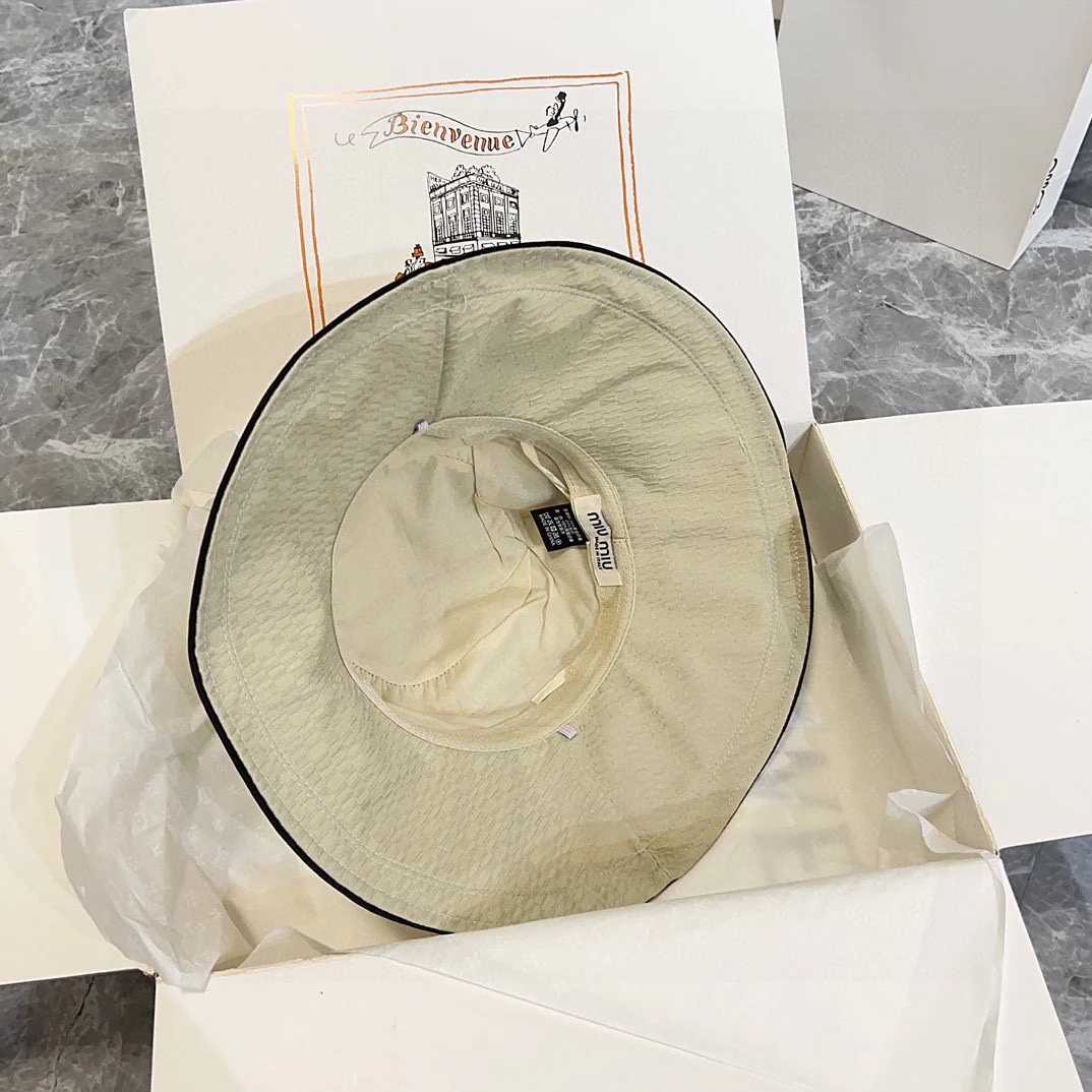 Новая широкополая солнцезащитная шляпа Miu Miu с бантом, модель 2024 года — серо-абрикосовая.