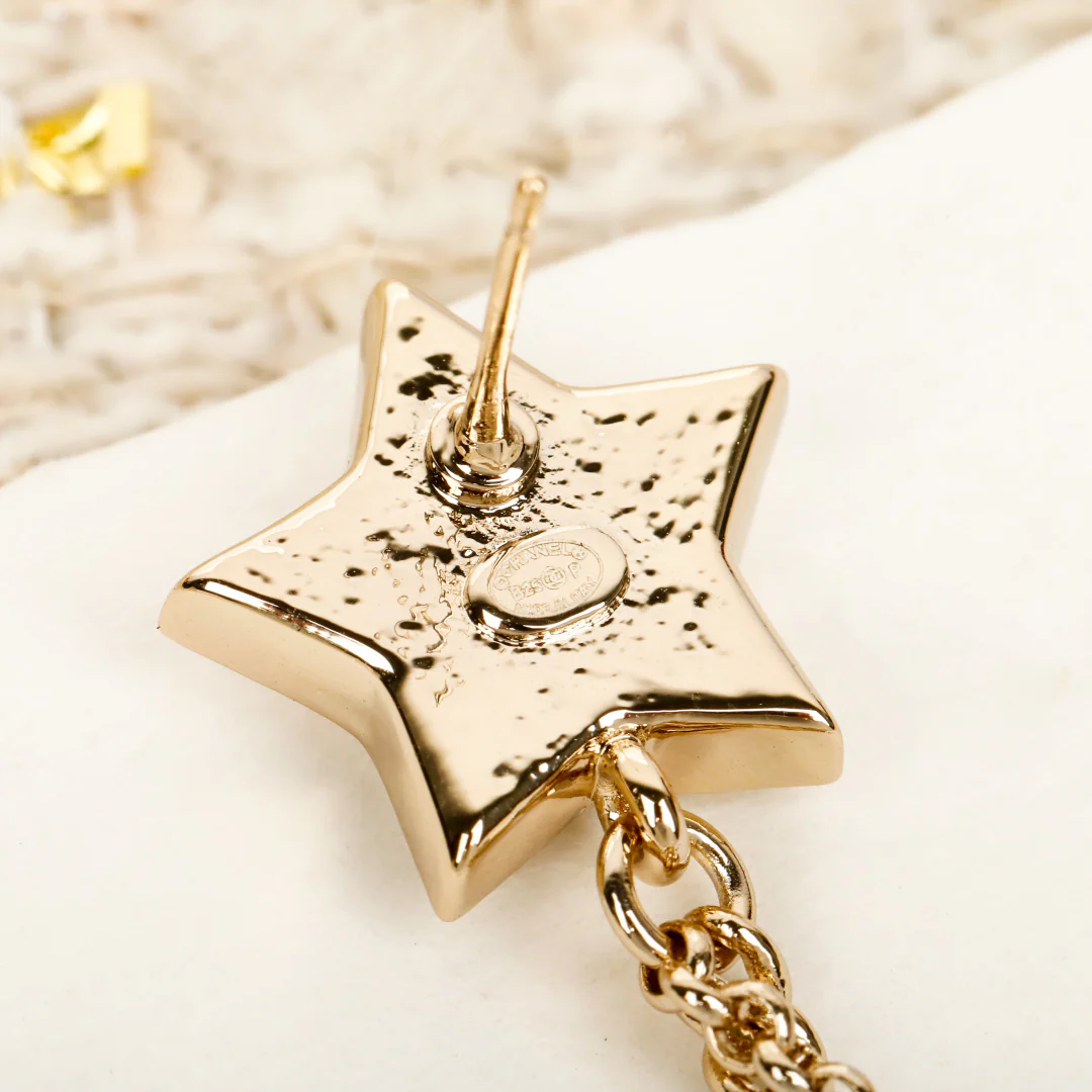 Chanel - Серьги-кисточки в виде звезд (25 пенсов)