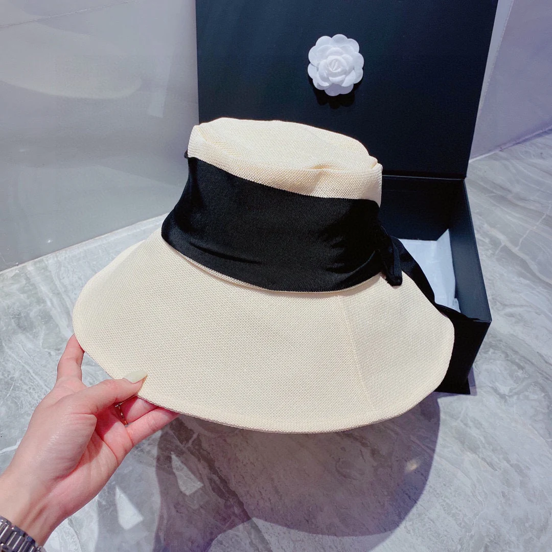 Шляпа Chanel с большим бантом от солнца