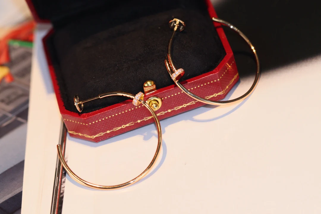 Cartier - Серьги-гвоздики - С половиной бриллианта