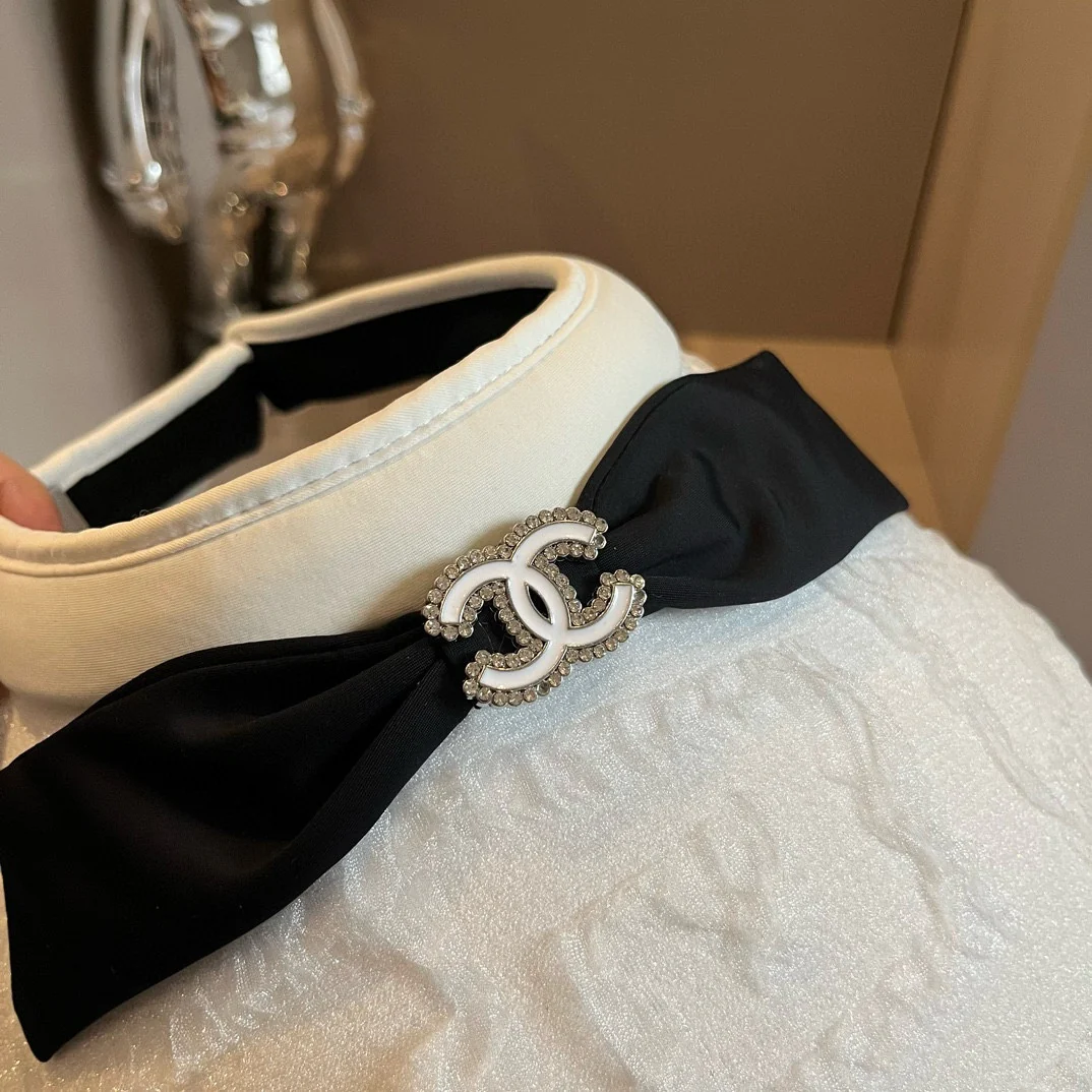 Chanel - Белая шляпа от солнца с бантом