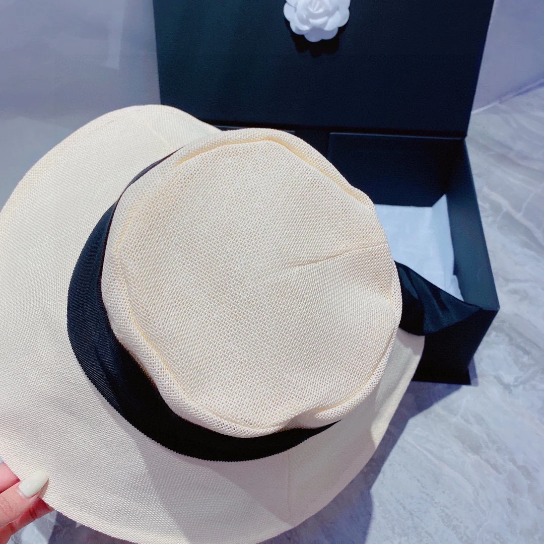 Шляпа Chanel с большим бантом от солнца