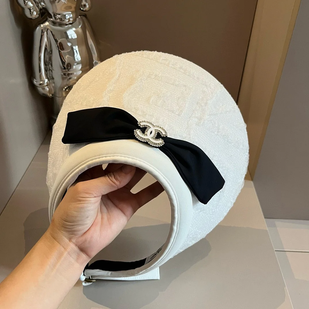 Chanel - Белая шляпа от солнца с бантом