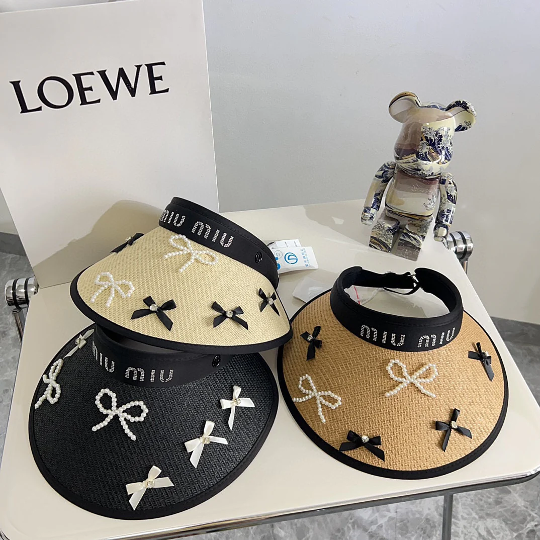 Новая летняя солнцезащитная шляпа Miu Miu 2024 с жемчужным бантом - черная.