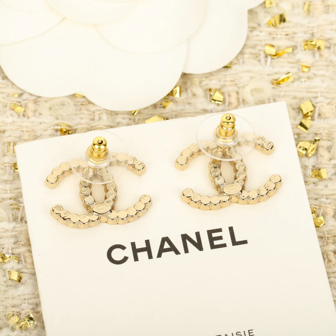 Chanel - Серьги с двойным бриллиантом C, 25 пенсов