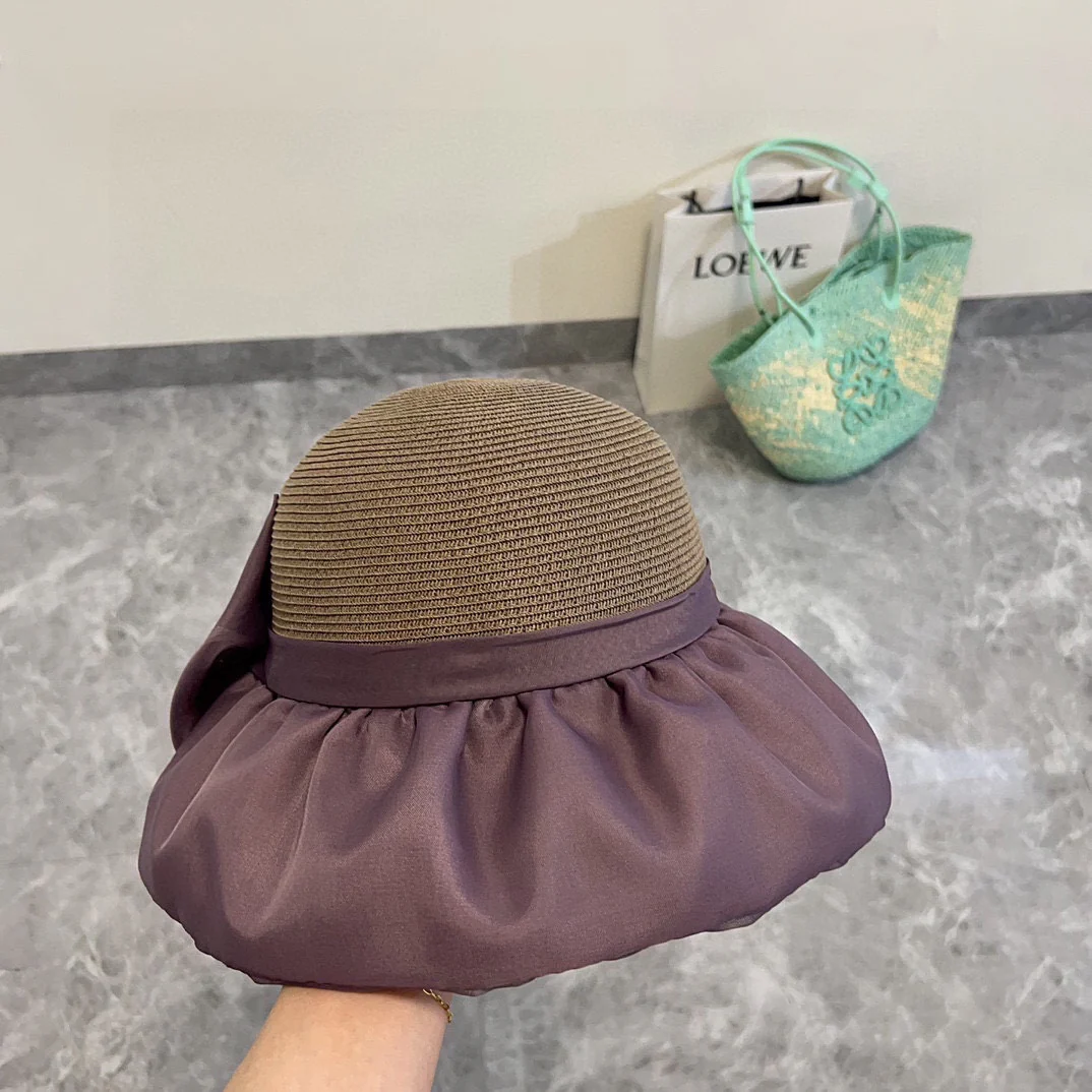 Новая широкополая плетеная шляпа от солнца Chanel весна/лето 2024 — фиолетовая.