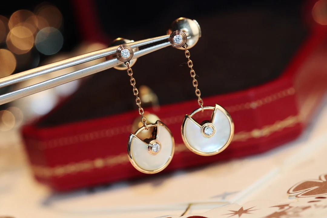 Серьги-амулеты Cartier