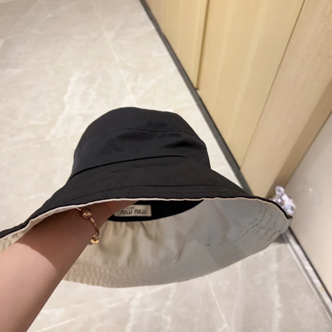 Новая панама Miu Miu с бантом, 2023 год - черная.