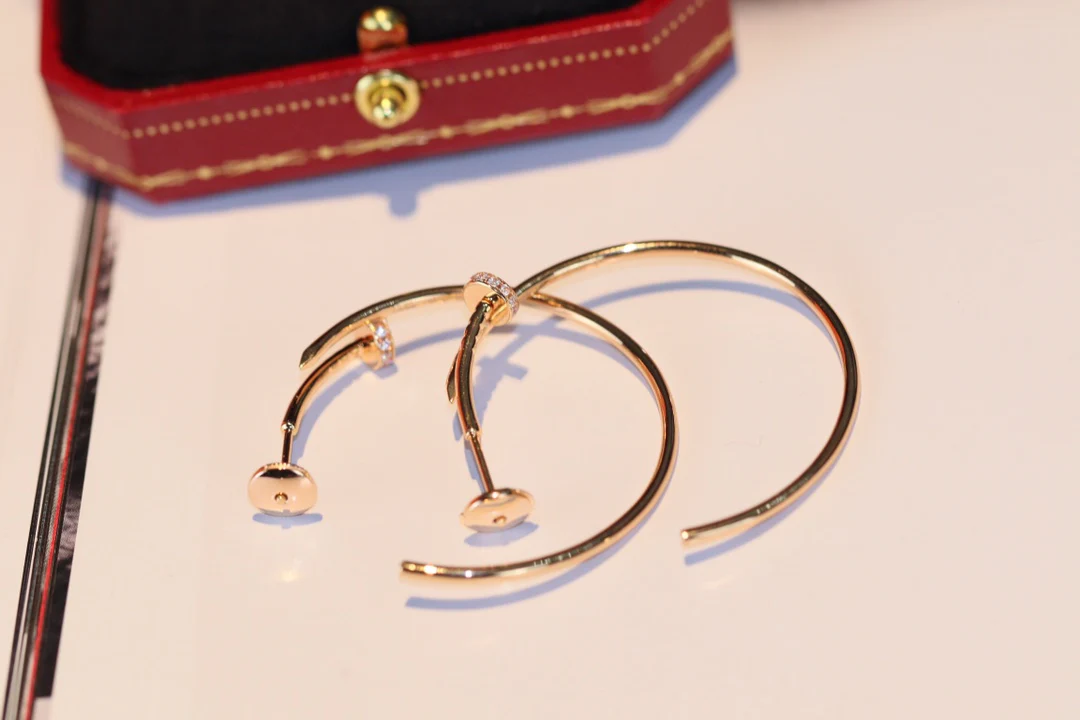 Cartier - Серьги-гвоздики - С половиной бриллианта