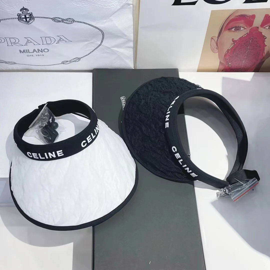 Солнцезащитная шляпа Celine черно-белого цвета с открытым верхом