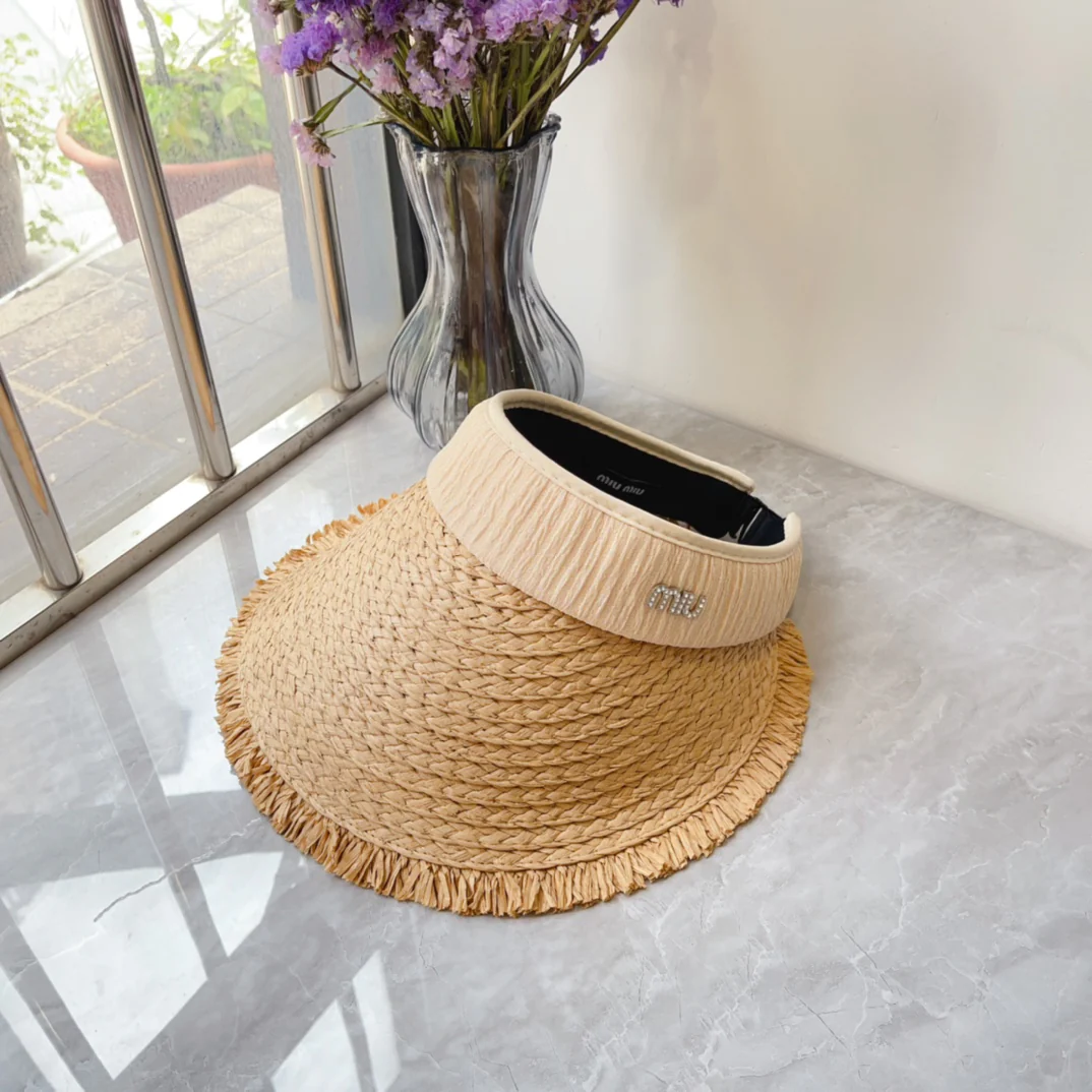 Miu Miu - Новинка лета: шляпа от солнца с расправленными полями