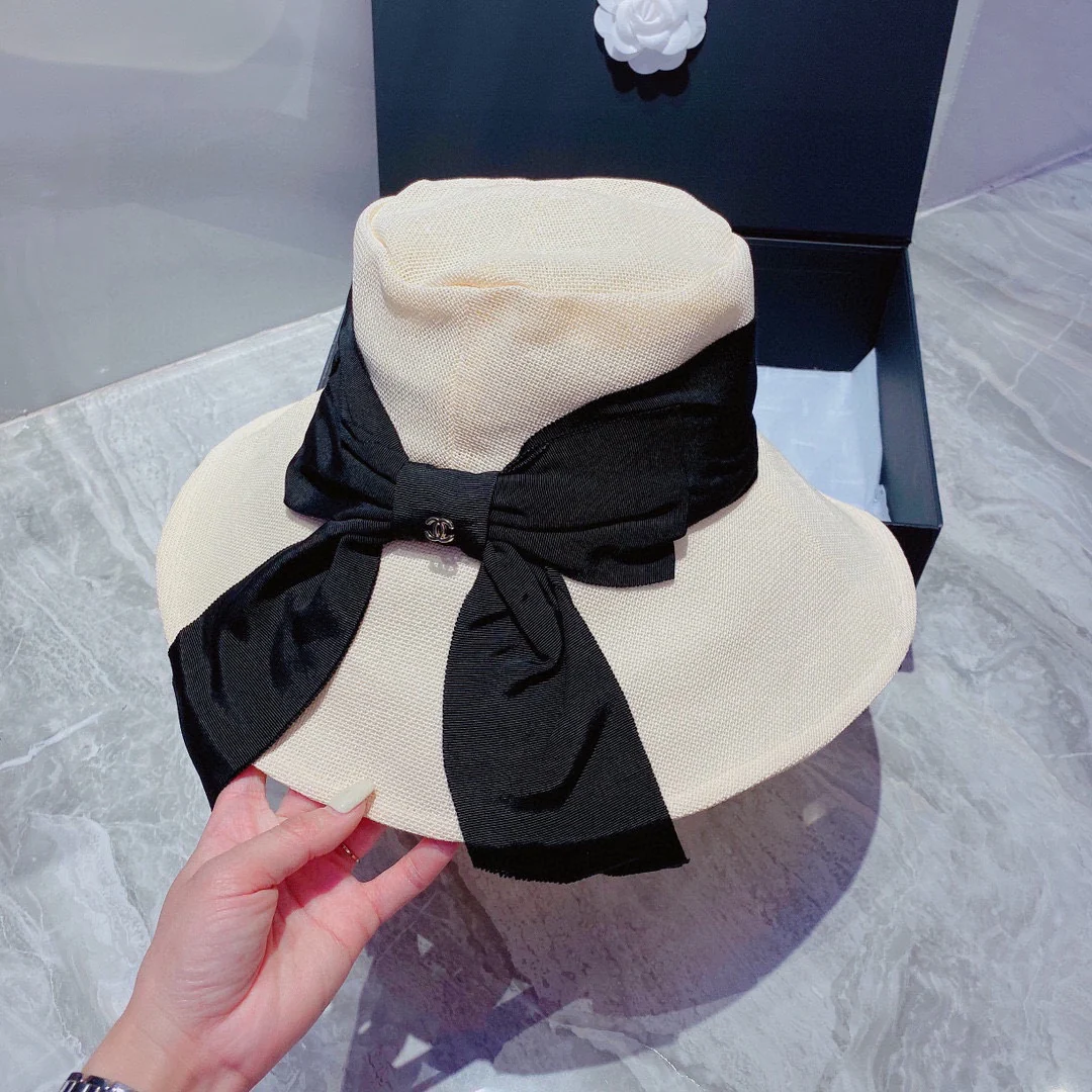 Шляпа Chanel с большим бантом от солнца