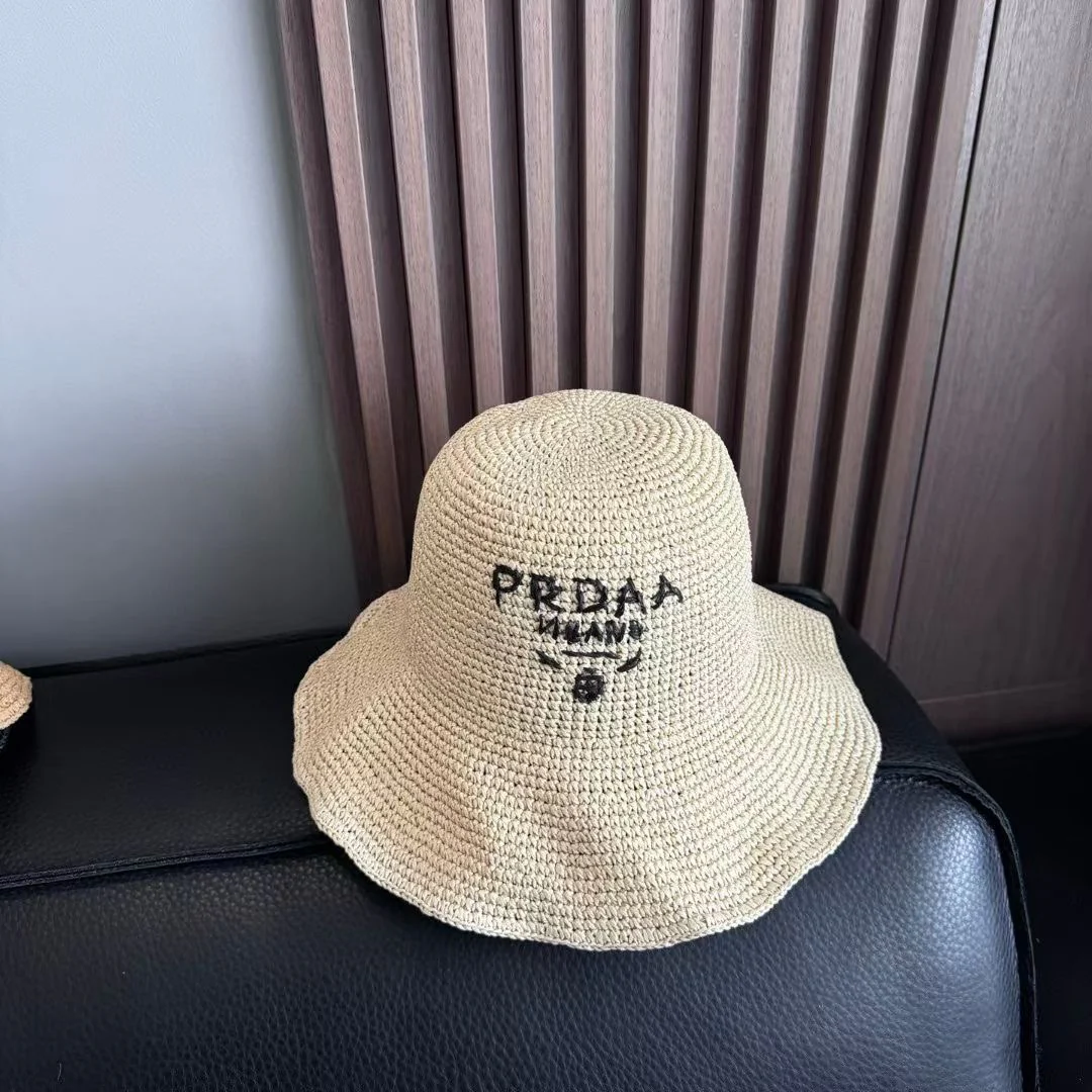Prada - Плетеная рыбацкая шляпа