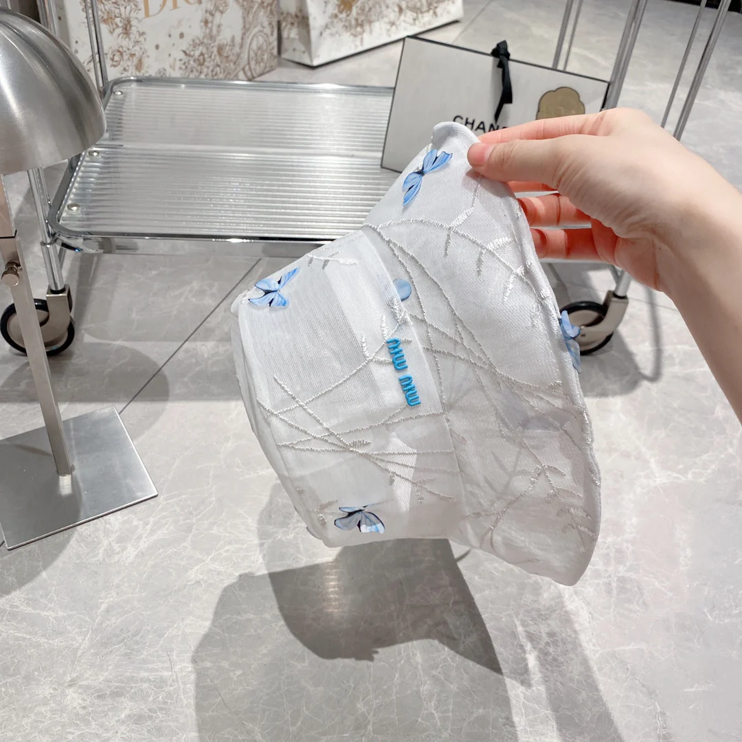 Новинка весны/лета Miu Miu 2023 — Рыбацкая шляпа из органзы — Синяя