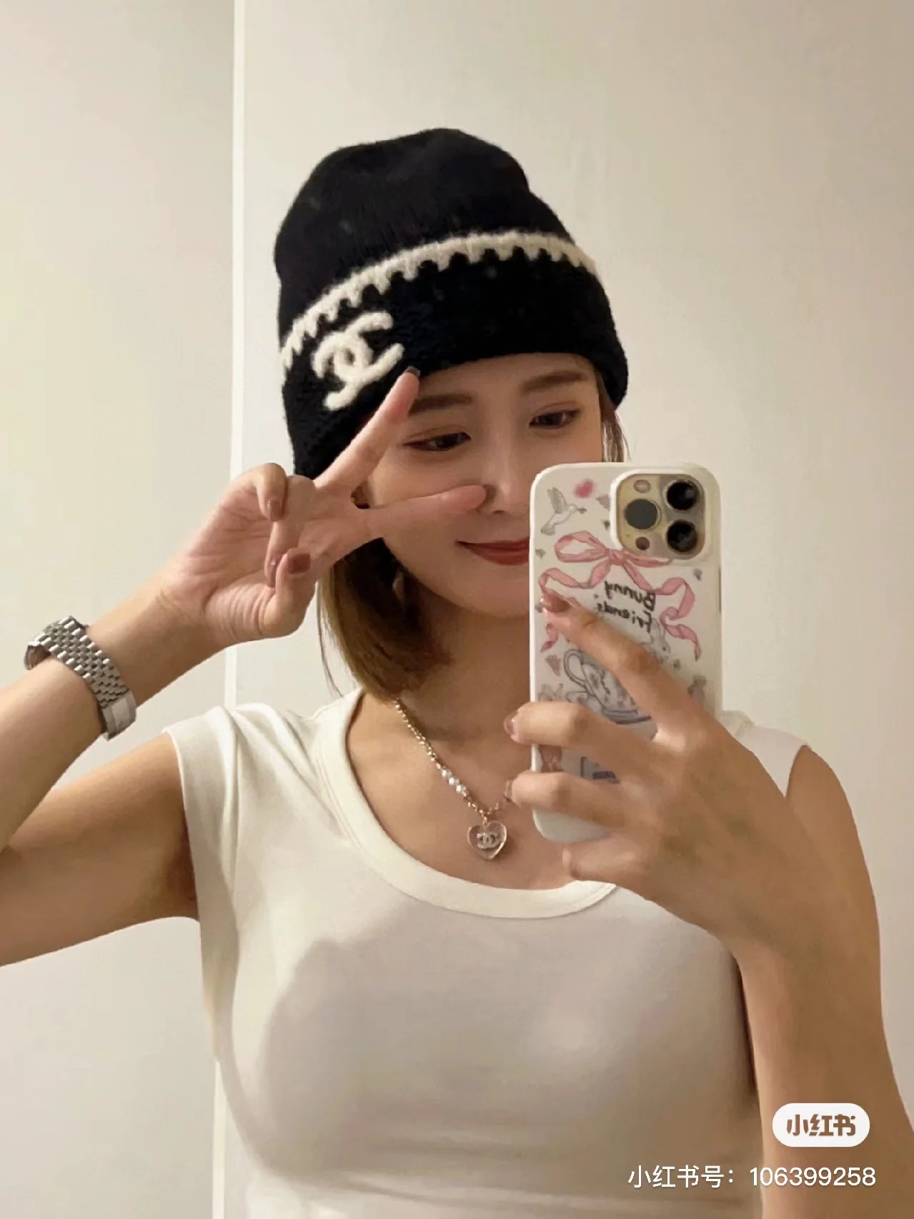 Вязаная минималистичная шерстяная шапка Chanel Double C из коллекции осень/зима, черная.